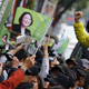 Taiwan's Democratic Progressive Party (DPP) Chairperson and presidential candidate Tsai Ing-wen greets supporters during a campaign rally in New Taipei City, Taiwan January 13, 2016.